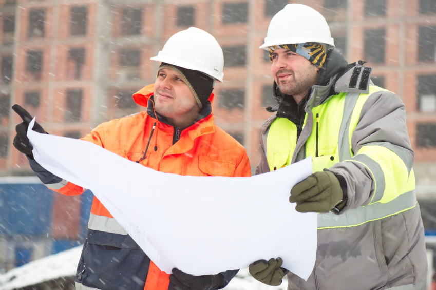 Civil Engineers At Construction Site In Winter Season