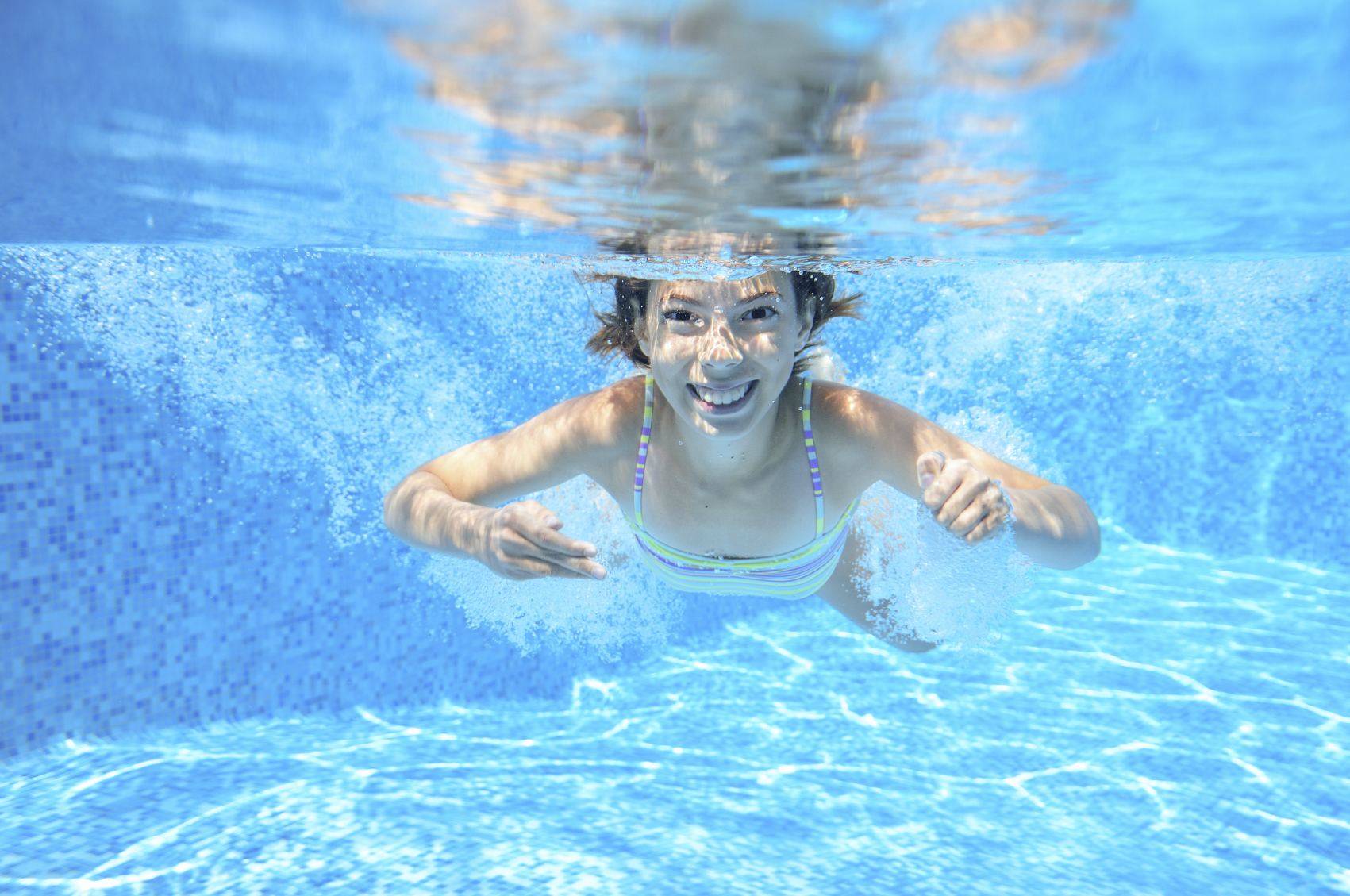 Girl Swimming Underwater