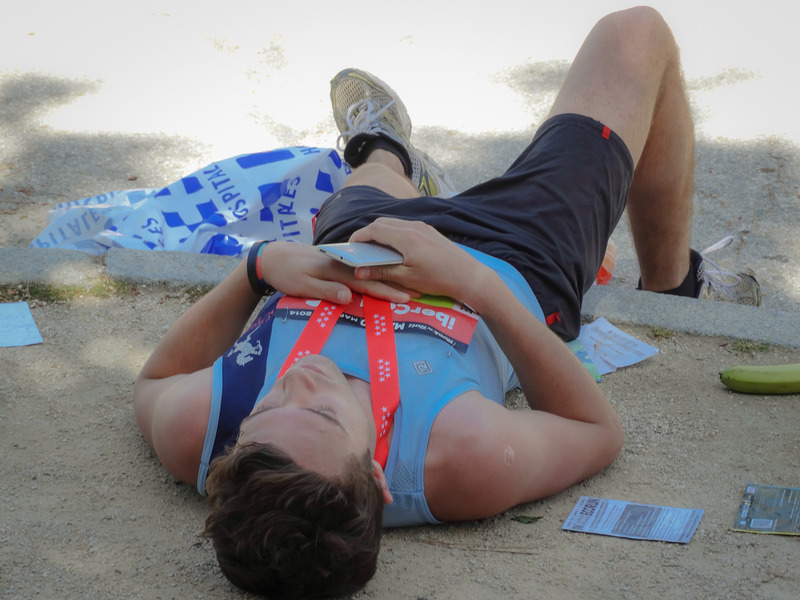 Young handsome man with custom medal feeling down