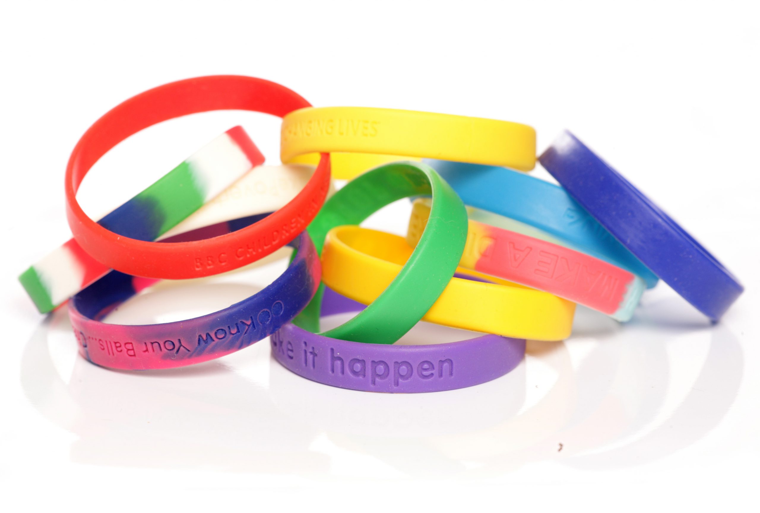 Pile of Silicone Wristbands that Can Be Used for Corporate Events