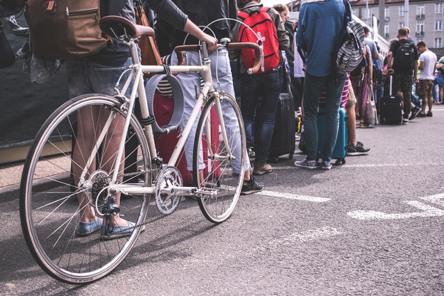 Pushing a bicycle in the city 